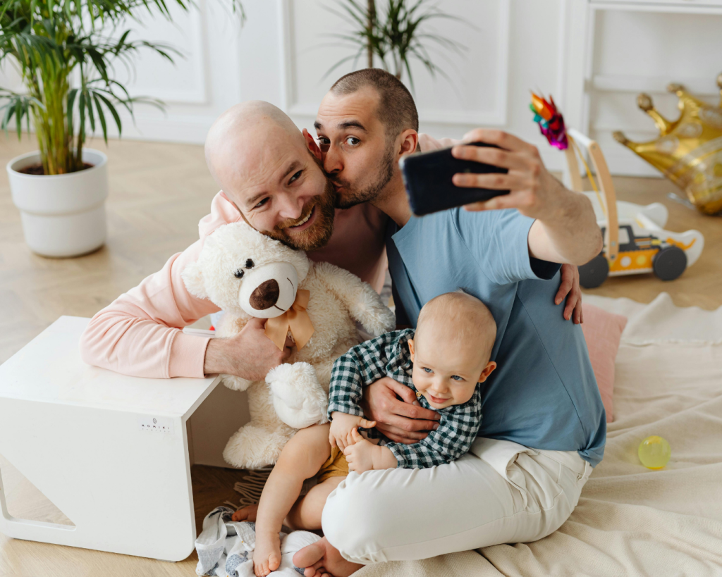 CRMH family taking selfie on floor